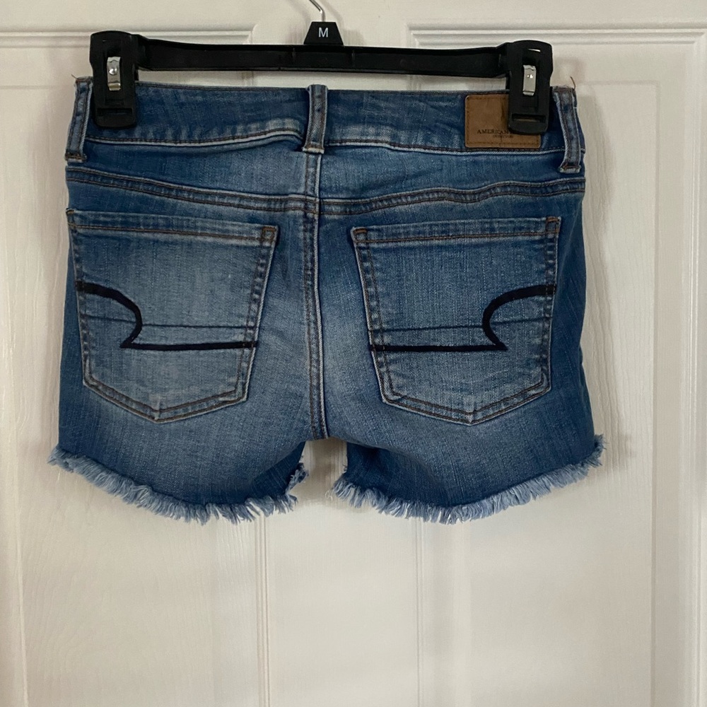 American Eagle Outfitters denim jean midi  cut off frayed shorts size 00